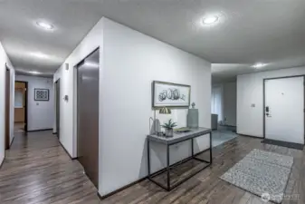 Foyer and hallway to bedrooms and baths