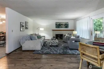 Family room is adjacent to the formal dining room and kitchen