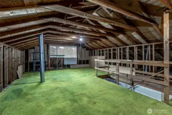 Unfinished loft/attic has plumbing stub. room to add bedrooms and bathroom