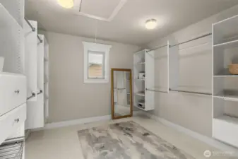 Primary walk-in closet with built-ins.