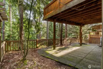 Step outside to a private backyard with patio and fire pit area—ideal for relaxing under the stars.