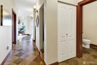 The view as you enter the front door of the unit.  Guest bath to the right.