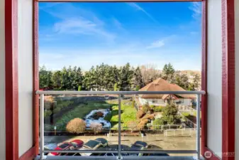 Dining-room lanai overlooking the complex—perfect for morning coffee or evening sunsets.