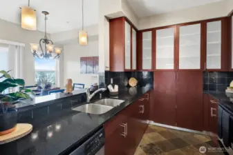Thoughtfully designed with ample cabinetry and counters, and great connection to dining space.