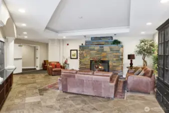 A gas fireplace is featured in the lobby of building B.
