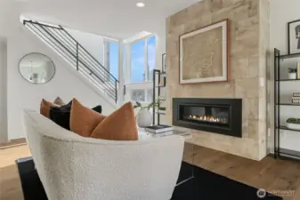 Cozy up to the beautiful gas fireplace.