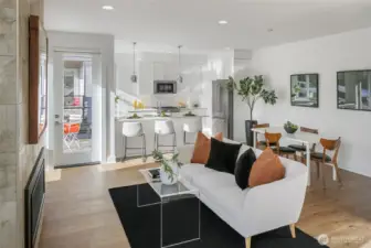 Well-designed main level connecting living, kitchen, and dining areas.