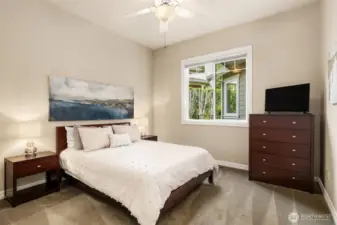 Main floor bedroom wing offers 2 bedrooms, both en-suite, with walk in closets