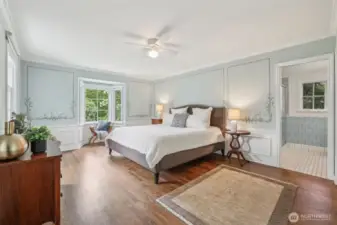 Primary bedroom with garden view