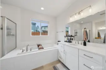 Gorgeous primary bath with two separate sinks/ counters