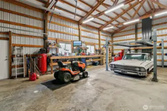 Car lovers rejoice in this huge 1200 sf shop with a lift!