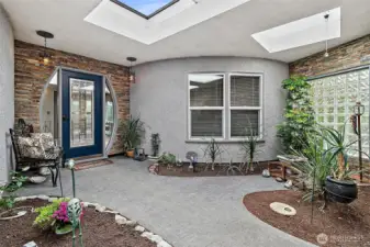 This beautiful atrium with lots of natural light with invites you in