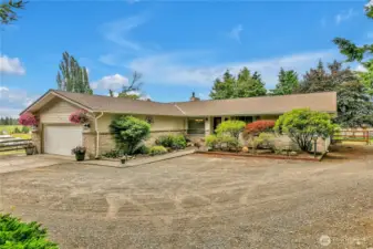 Large level entry rambler with attached garage and plenty of parking
