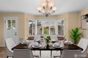 Eating area off of the kitchen--breakfast/lunch/dinner nook...virtually staged.