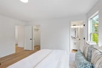Primary bath and walk-in closet