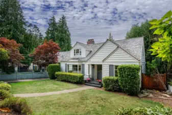 Desirable flat front yard with just a few steps to the front door.