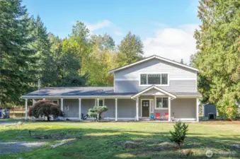 Experience luxury living in this stunning home on a shy 5 acre parcel—where elegance meets tranquility