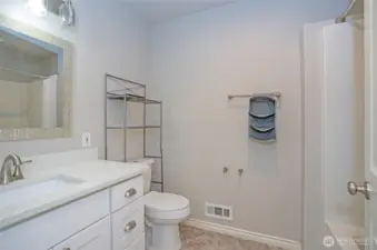 Well-appointed guest bath designed for comfort and convenience
