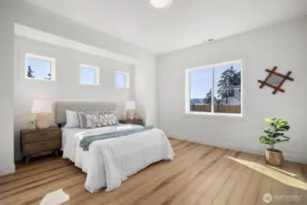 The primary suite is very spacious and has saltwater views.
