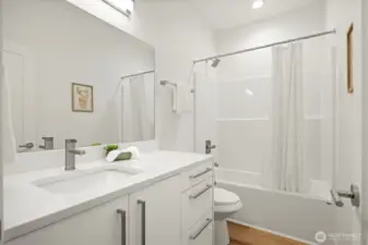 The full bath is across the hall from the 2nd and 3rd bedrooms.