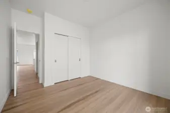 Looking from the third bedroom towards the kitchen.