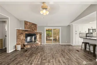 Great room with slider to covered front porch!