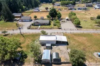 Beautiful dual-parcel property offering exceptional flexibility and space. One parcel features the home and detached garage, while the second includes pastures, a horse arena, and a barn, with effective field drainage designed to support year-round usability. The parcel with the barn is buildable for an additional residence and potential ADU, buyer to verify to their satisfaction. A rare opportunity in Tacoma.