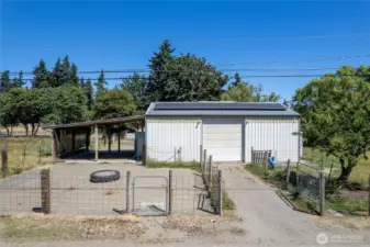 Barn- This structure is served by 200-amp electrical service and includes ten solar panels to support efficiency. LED lighting and partial insulation enhance functionality, while a small storage loft and attached awning add versatility.