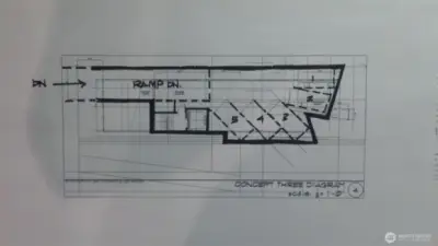 Preliminary redevelopment concept diagram illustrating potential parking configuration and building layout. Buyer to verify all development feasibility with the City of Seattle