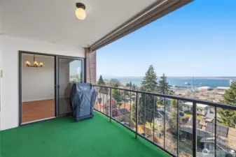 Slider to the covered view deck with powered sun shade and propane BBQ (stays)