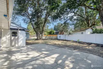 View of massive rear patio looking out onto back yard.perfect for entertaining.