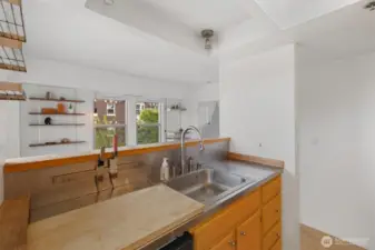 A view of the living space from behind the kitchen counters