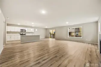 Open concept living/dining/kitchen-Interior Pictures: Disclaimer- Photos are of another Finley floor plan from a previous community, photos are for illustrative purposes only. Finishes, flooring, upgrades, or other features may vary.