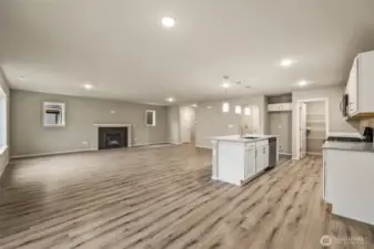 Open concept living/dining/kitchen-Interior Pictures: Disclaimer- Photos are of another Finley floor plan from a previous community, photos are for illustrative purposes only. Finishes, flooring, upgrades, or other features may vary.
