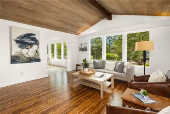 Beautiful T and G cedar vaulted ceilings, bamboo floors and large window create an airy and open feeling.