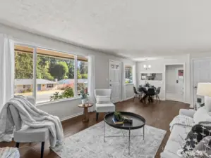 Large windows in every room allow an abundance of natural light to penetrate the home and reflect beautifully off the fresh interior paint.