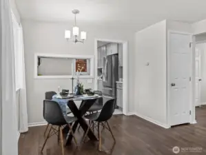 The dining area is adequate size and conveniently located between the living area and kitchen. The passthrough to the kitchen keeps it nice and open feeling.