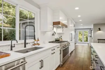 High-end appliances by GE and Liebherr are a dream to cook with. The range has 6 burners, a griddle top, dual ovens, and a pot filler!