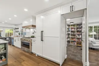 Tucked behind a door is a secret, hidden and spacious pantry!