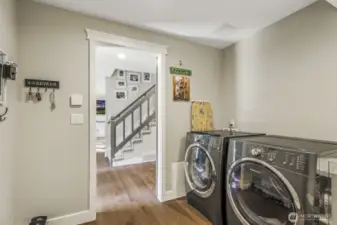 This laundry room/mudroom combo connects the garage to the home.