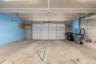 Roomy 2 car garage with plenty of space for storage