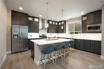 Cabinets all the way to the ceiling to maximize storage.