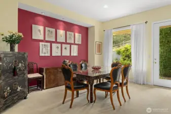 The dining room has great size and can definitely handle your dining room set.