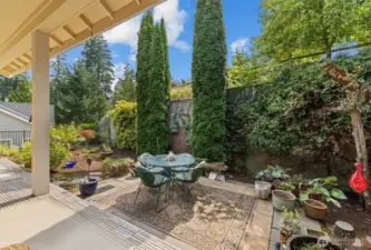 Enjoy this private covered patio and outdoor garden space.  One of the things the seller likes most about this home is that eventhough you are in a neighborhood, you barely feel your neighbors.