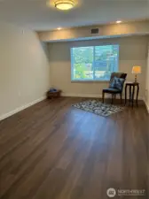 Primary bedroom suite, all rooms with easy care vinyl plank flooring.