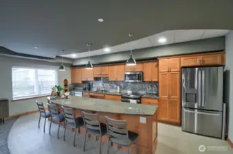 Kitchen in the Community Room has plates, glassware, etc. for all members. Great for community wide events and can be reserved for member's private functions as well.