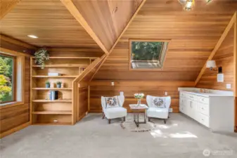 Bonus space off the master with fireplace and sink—ideal for a lounge, office, or nursery.