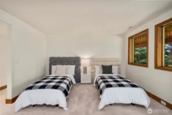 The lower level features a private, fully equipped living space—ideal for extended guests, multi-generational living, or potential rental income.