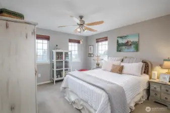 Primary bedroom with sitting room and view of the Puget Sound