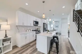 Another great kitchen view. Quiet Ductless AC on this level and the upper level to keep you warm or cool depending on the season.